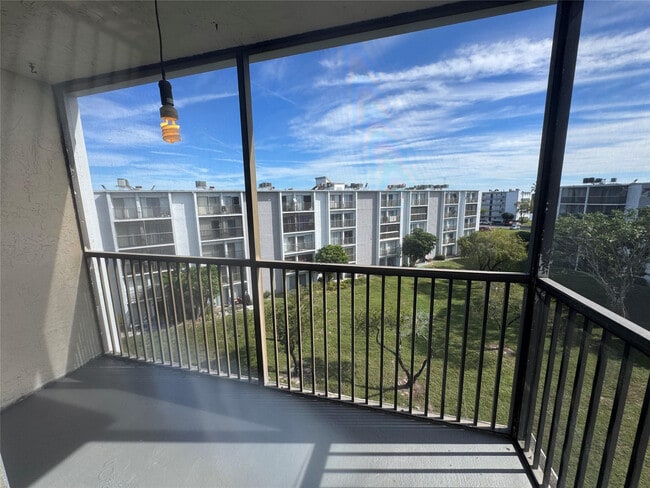 Building Photo - 8750 N Sherman Cir