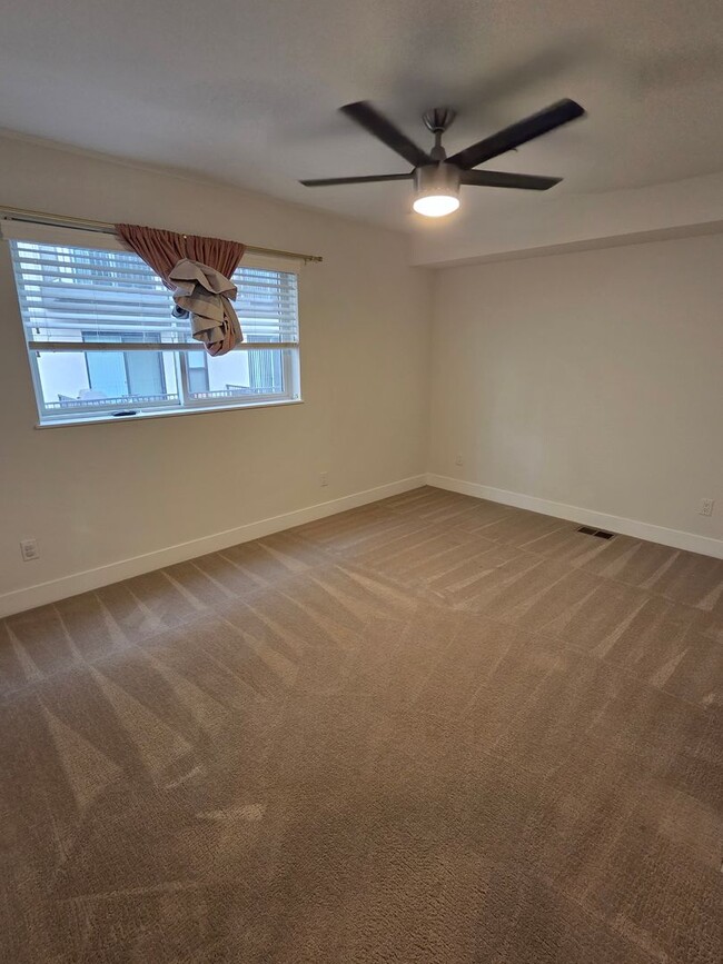 Building Photo - STUNNING 4-LEVEL TOWNHOME IN HIGHLANDS WITH SAUNA, 2-CAR GARAGE + AMAZING ROOFTOP DECK!