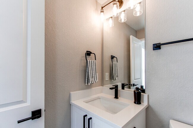 Third bedroom ensuite three-quarter bath - 8500 W 62nd Ave