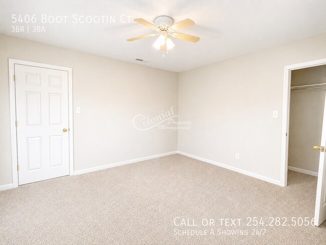 Building Photo - 5406 Boot Scootin Ct