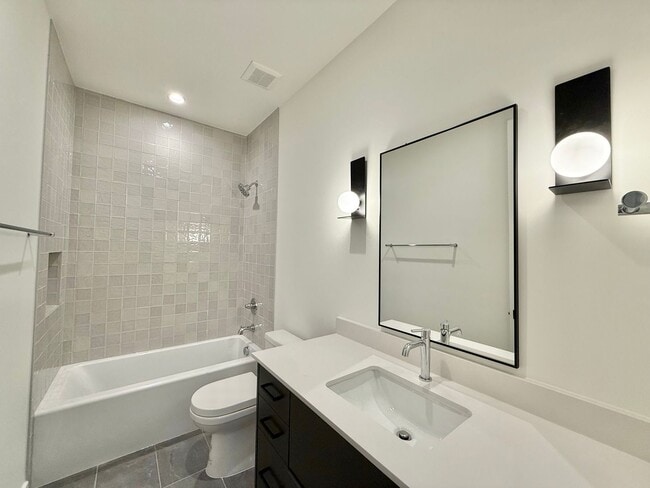 Building Photo - Luxurious New Construction 4BD, 2.5BA Raleigh Townhome with a Rooftop Terrace in a Prime Location...