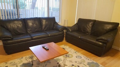 Building Photo - Luxurious 2-Bed/2-Bath Condo in Quiet Gated Community - Coming Soon!