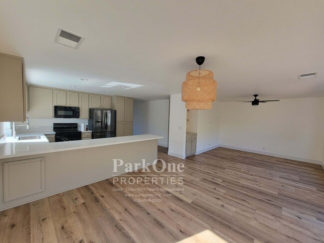 Building Photo - Spacious Updated Home with Expansive Private Yard