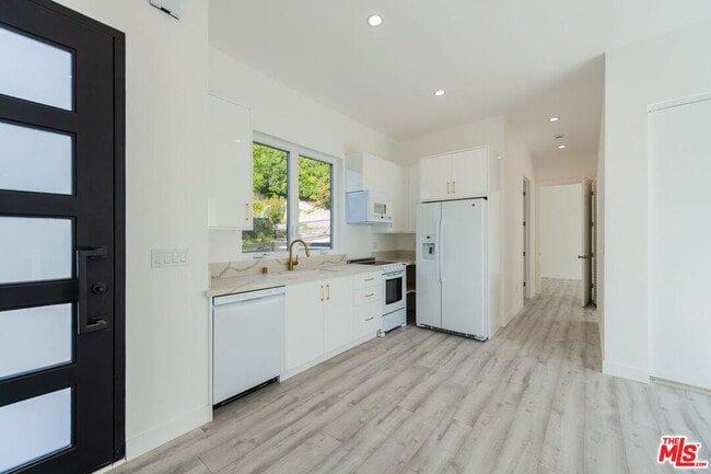 Building Photo - 4724 El Caballero Dr