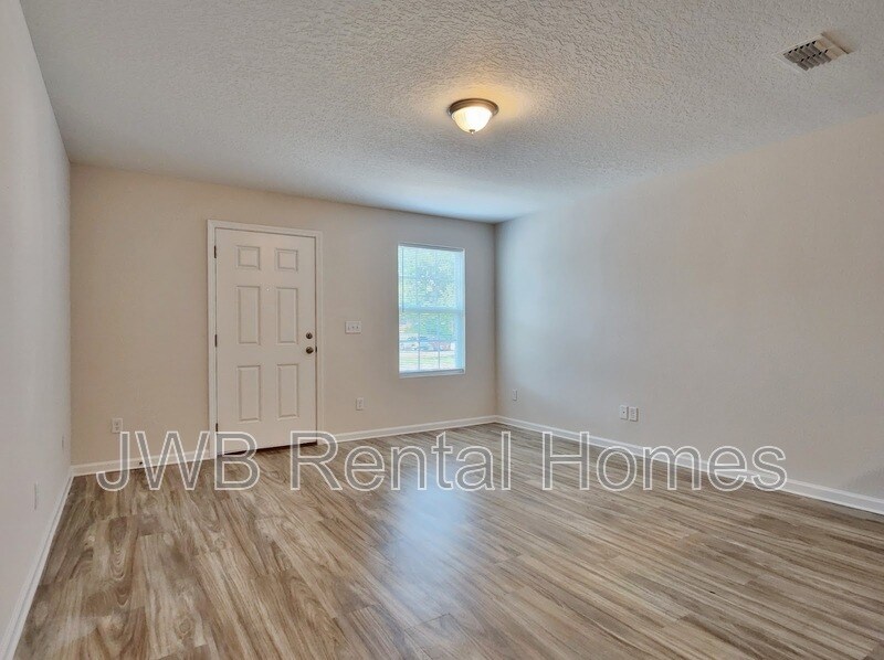 Building Photo - 8496 McGirts Village Ln