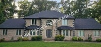 Building Photo - Exceptional 5-Bedroom Home with Luxury Out...