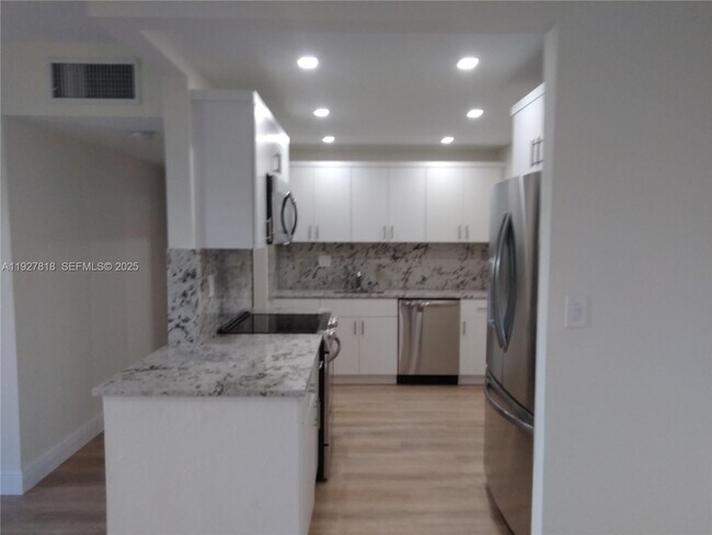 Building Photo - 8325 SW 72nd Ave