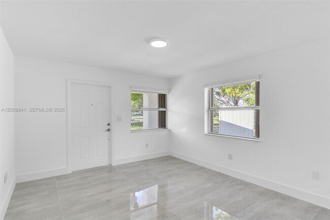 Building Photo - 9999 NW 25th Terrace