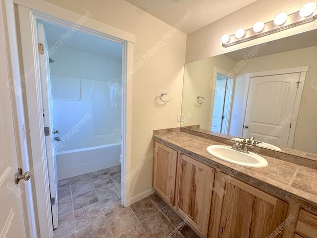 Building Photo - 3 BR home with fenced yard