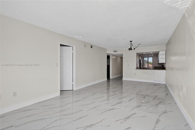 Building Photo - 9915 W Okeechobee Rd