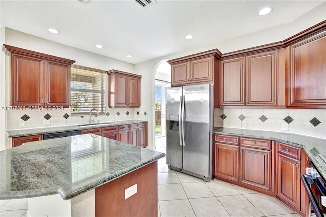 Building Photo - Southwest 51st Street, Miramar, FL 33027 - 5 BR 3.5 BA single-family home