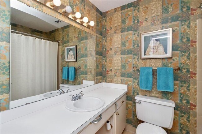 Building Photo - WELCOME TO GEORGETOWN CONDOMINIUMS IN SPRI...
