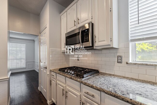 Building Photo - Recently Updated Plano Property with Modern Features and Serene Surroundings