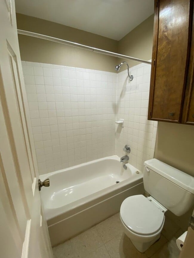 Building Photo - SPACIOUS & CUTE 2 bedroom 2 bath townhouse off Sunset Dr COMING SOON!