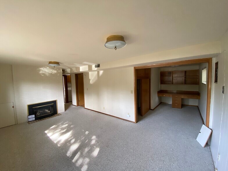 Lower level Family room with gas furnace & Den - 8700 25th Ave NE