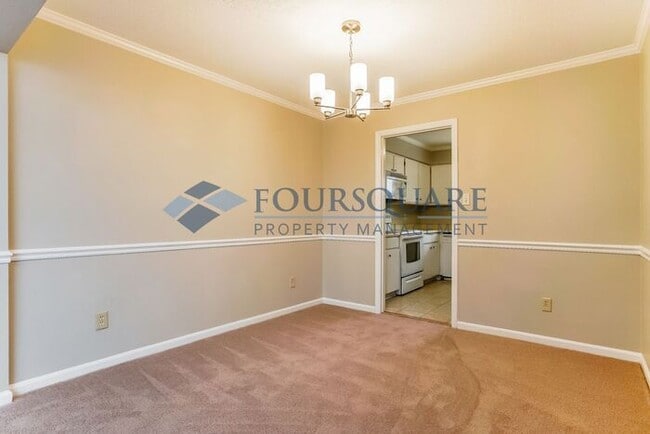 Building Photo - Spacious Townhome with Wood-Burning Fireplace, Large Deck & Storage Room , Convenient North Ridge...