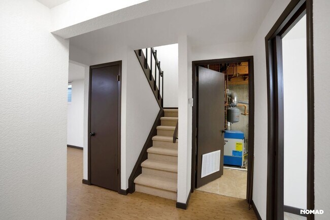 Building Photo - Spacious 4BR Condo in Evergreen