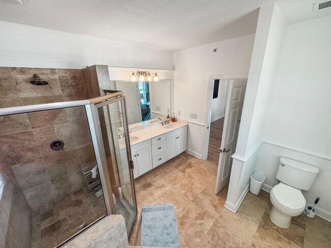 Building Photo - Fully Furnished Waterfront Elegance on Mai...