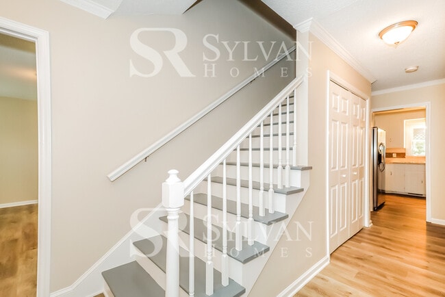 Building Photo - The living is easy in this 4 bedroom, 2 bathroom home