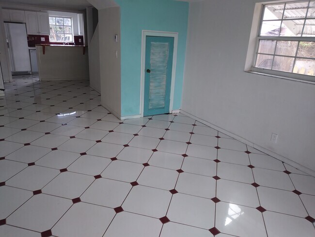 Living and Dining room with storage - 401 Sunshine Dr