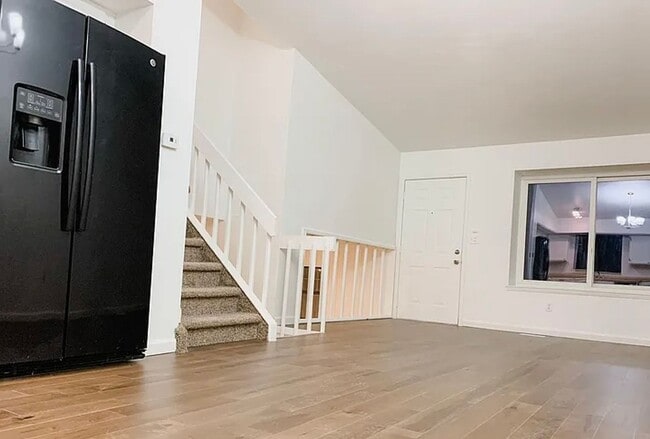 Building Photo - 4BR Tri-Level with Sunroom & Oversized Fenced Yard & 2-Car Garage!