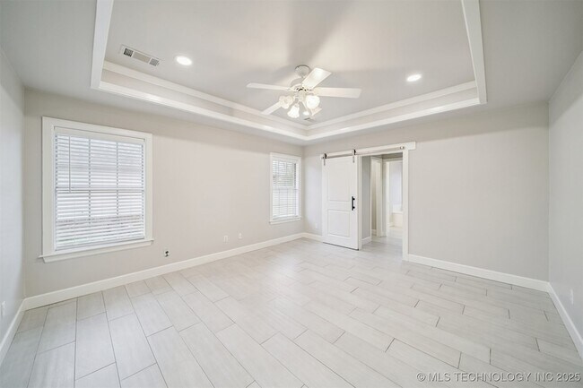 Building Photo - 7922 N 125th E Ave