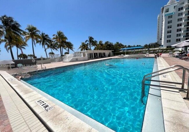 Building Photo - 5005 Collins Ave