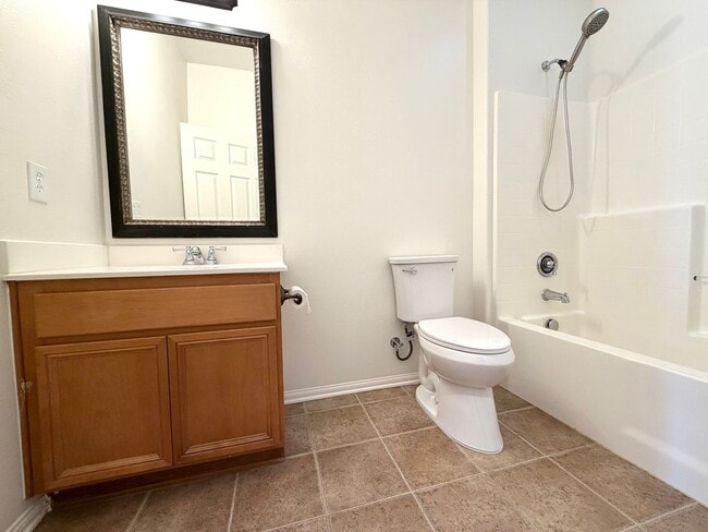 Building Photo - Energy Efficient 5 Bedroom Home with Paid Solar & Covered Patio