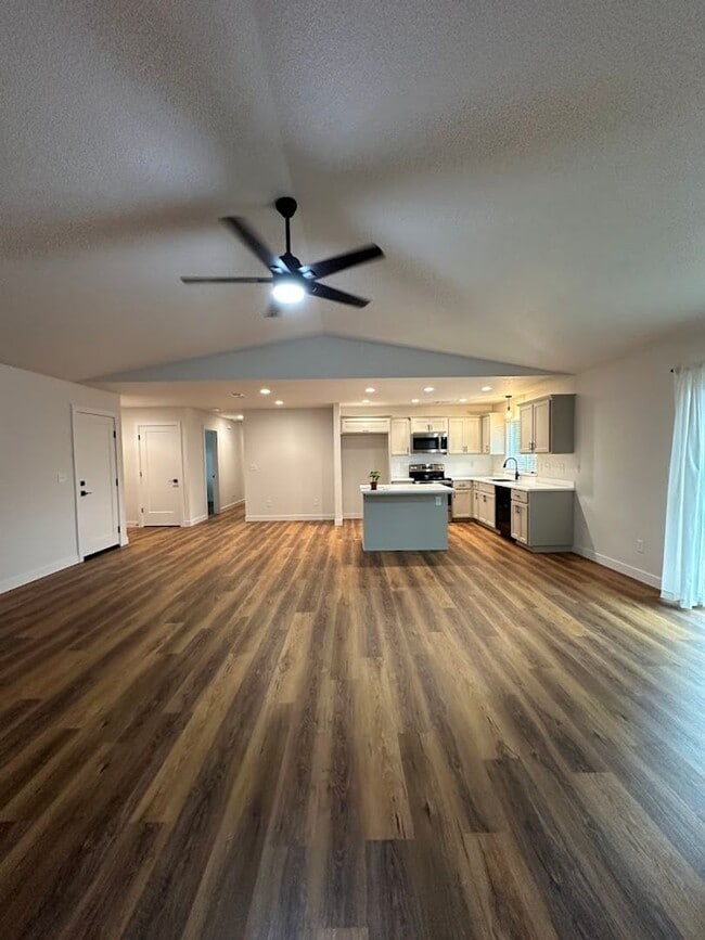Building Photo - Updated Home with Island Kitchen, LVP Flooring, and Yard Care Included!