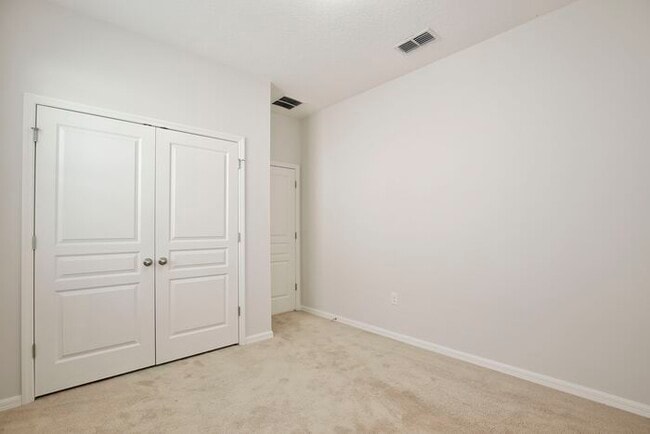 Building Photo - Stylish 4/3 Home with Covered Patio & Gara...