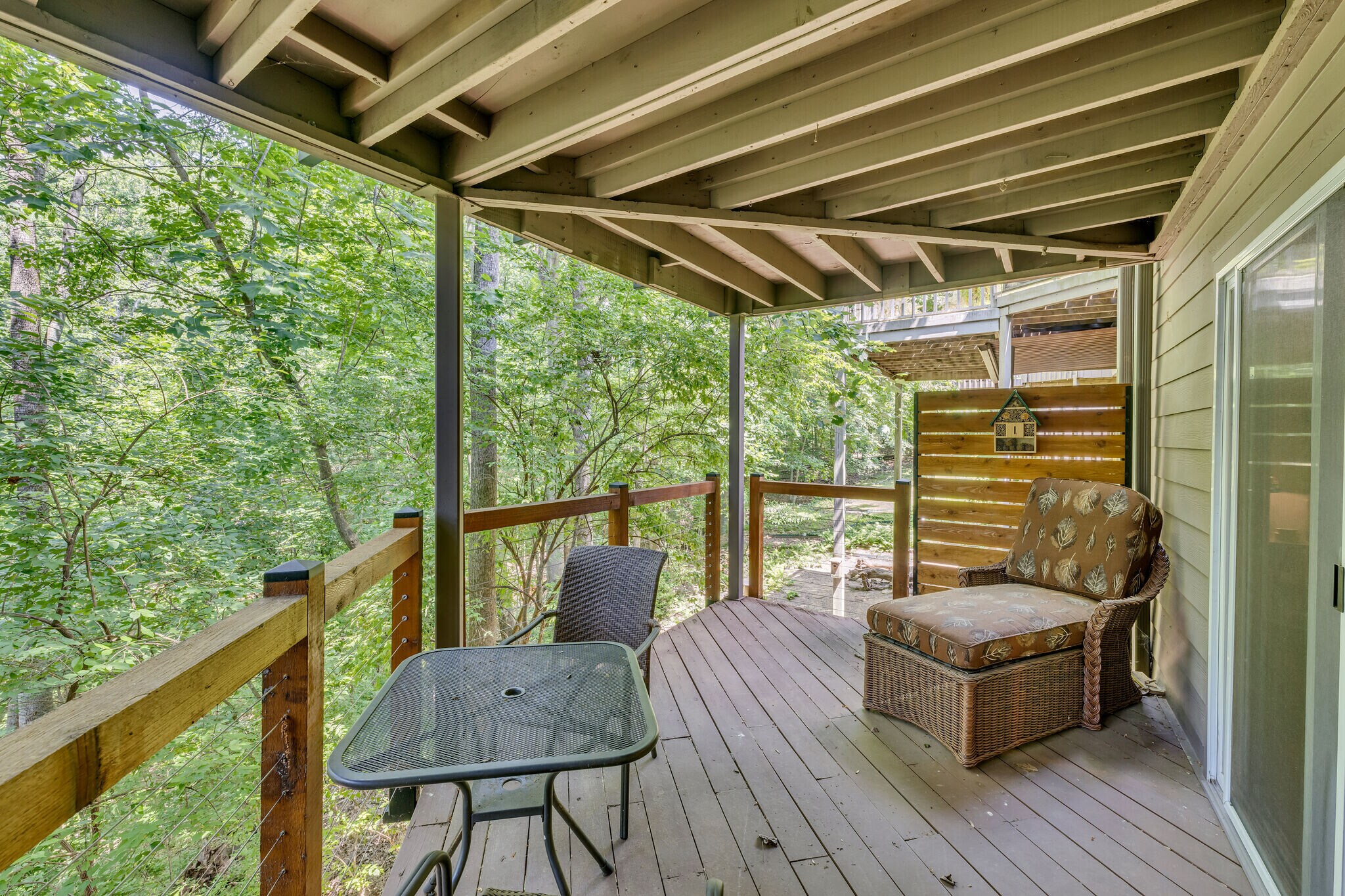 The private covered deck off the primary BR - 918 Harpeth Trace Dr