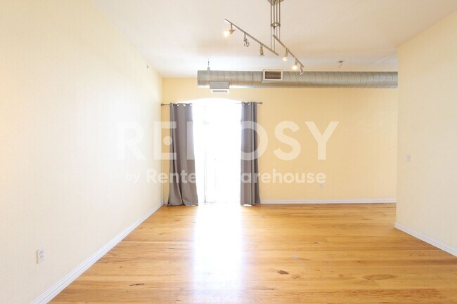 Building Photo - Spacious Penthouse Loft Garage Parking Included in Price!  - 3rd and Broadway in the Heart of Den...