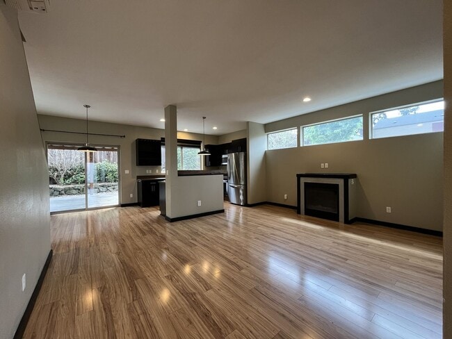 Building Photo - Charming 3 Bedroom, 2.5 Bathroom Home with Large Living Room, Tall Windows, Island Kitchen, and A...