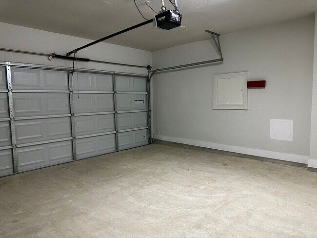 Building Photo - For Lease – Modern 2023 Condo Backing to Greenbelt | Creekside at Pioneer Crossing West