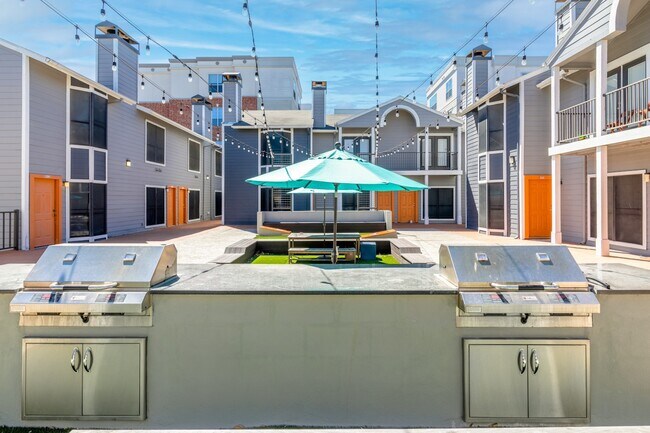 2 grills and umbrellas - 2710 Nueces St