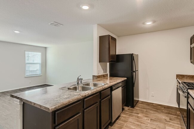 Building Photo - HALF OFF First Month Rent located near Lac...