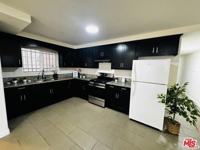 Building Photo - 10952 1/2 Wilmington Ave