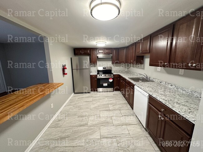 Building Photo - Stylish & Fully Furnished 3-Bedroom, 2-Bat...