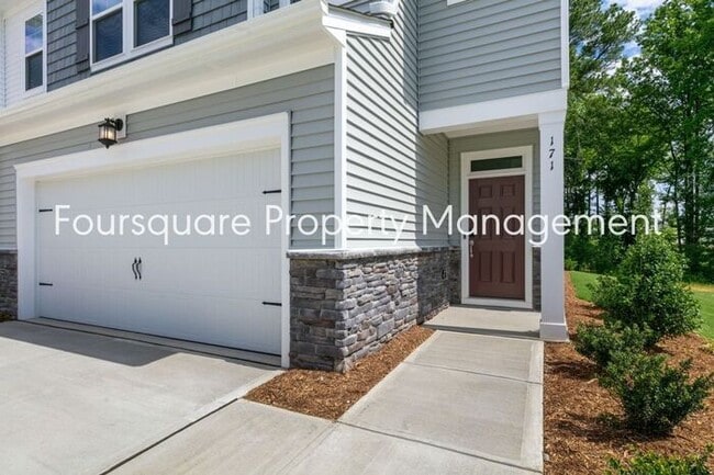 Building Photo - Coming Soon; July 27, 2026 : End unit ToSpacious End-Unit Townhome with 2nd Floor Loft, Screened-...