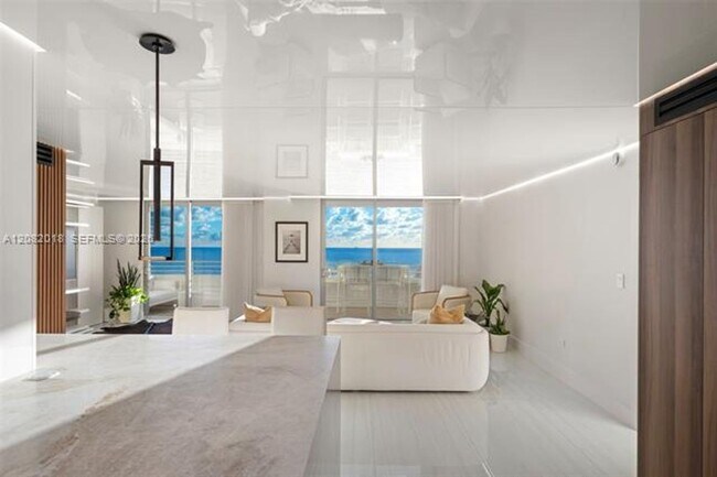 Building Photo - 5555 Collins Ave