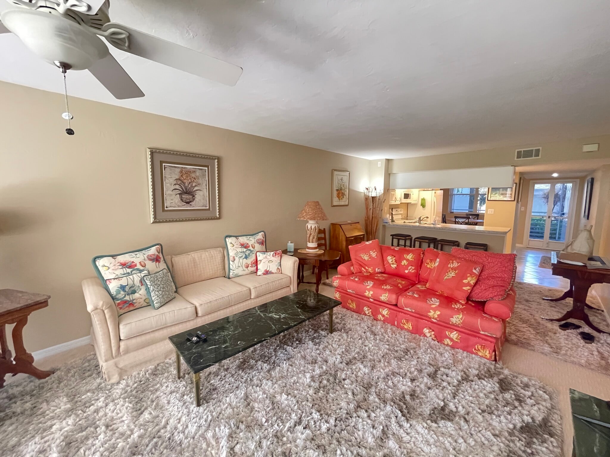 Entrance unit, kitchen, bar, diniing, living area - 285 Naples Cove Dr