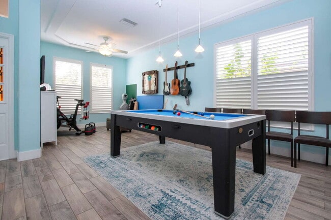 Building Photo - Luxurious 4-Bed Oasis with Outdoor Kitchen...
