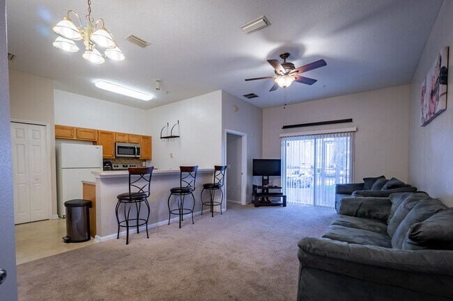 Building Photo - Spacious 2BR/2BA Condo – First Floor, Gate...
