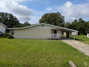 Building Photo - 2/2 fenced in yard located in RAINBOW LAKE...