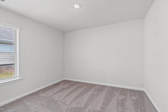 Building Photo - New 3BR Home in Whispering Woods – Modern ...
