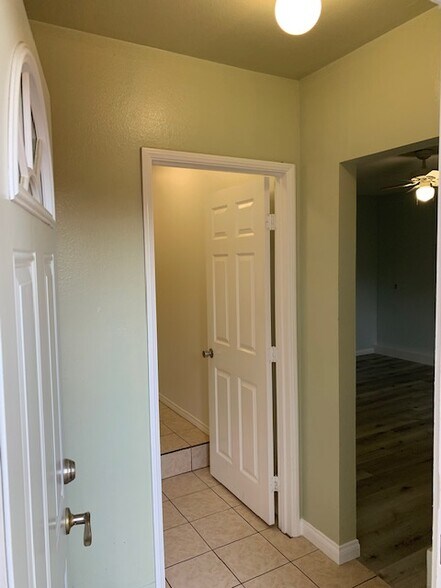 Entrance to the studio, the bathroom on the left and entrance to the bedroom on the right - 5029 Douglas Ln