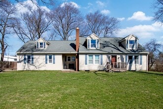 Building Photo - Four Bedroom Single-Family Home