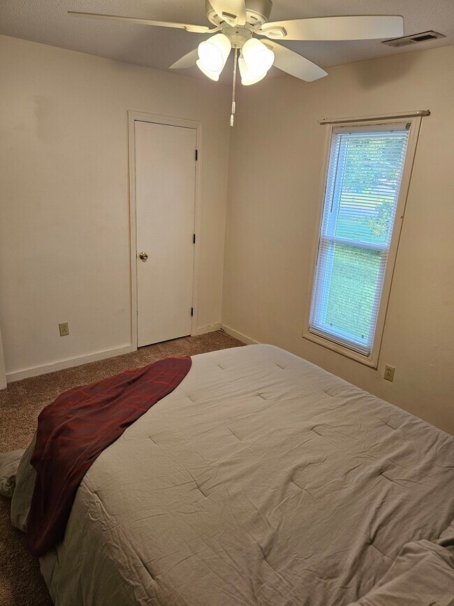 Front bedroom with closet door - 404 Rams Rd