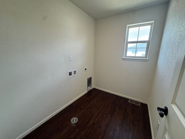 Building Photo - Luxury Corner Lot Home in Banning Lewis with Finished Basement, Wet Bar & Designer Upgrades