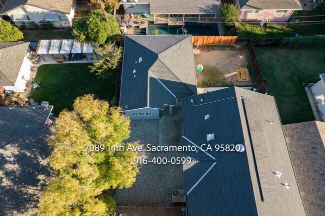 Building Photo - 7089 14th Ave